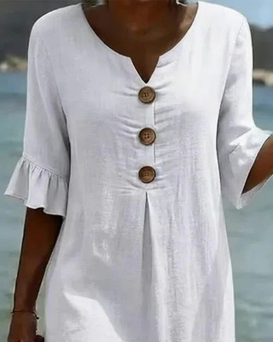 Monique | Vestido abotonado con aspecto de lino y mangas abullonadas